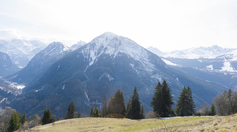 a view of a mountain range with snow on the top