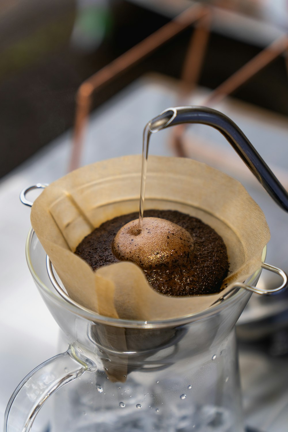 a coffee pot filled with a brown substance