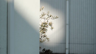 Technician repairing an air conditioning unit on a sunny day