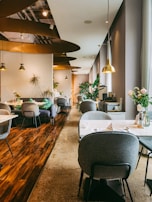 Restaurant interior with stylish seating and ambient lighting.