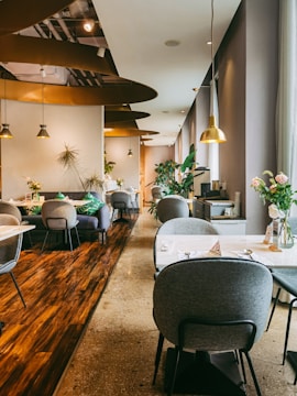 A stylish restaurant interior with ambient lighting and modern decor.