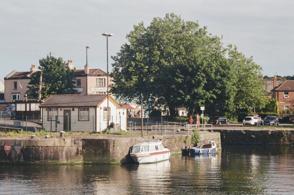 a small boat floating on top of a river