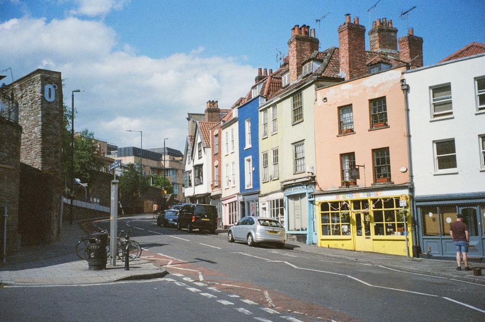 a city street with a lot of buildings on both sides of the street