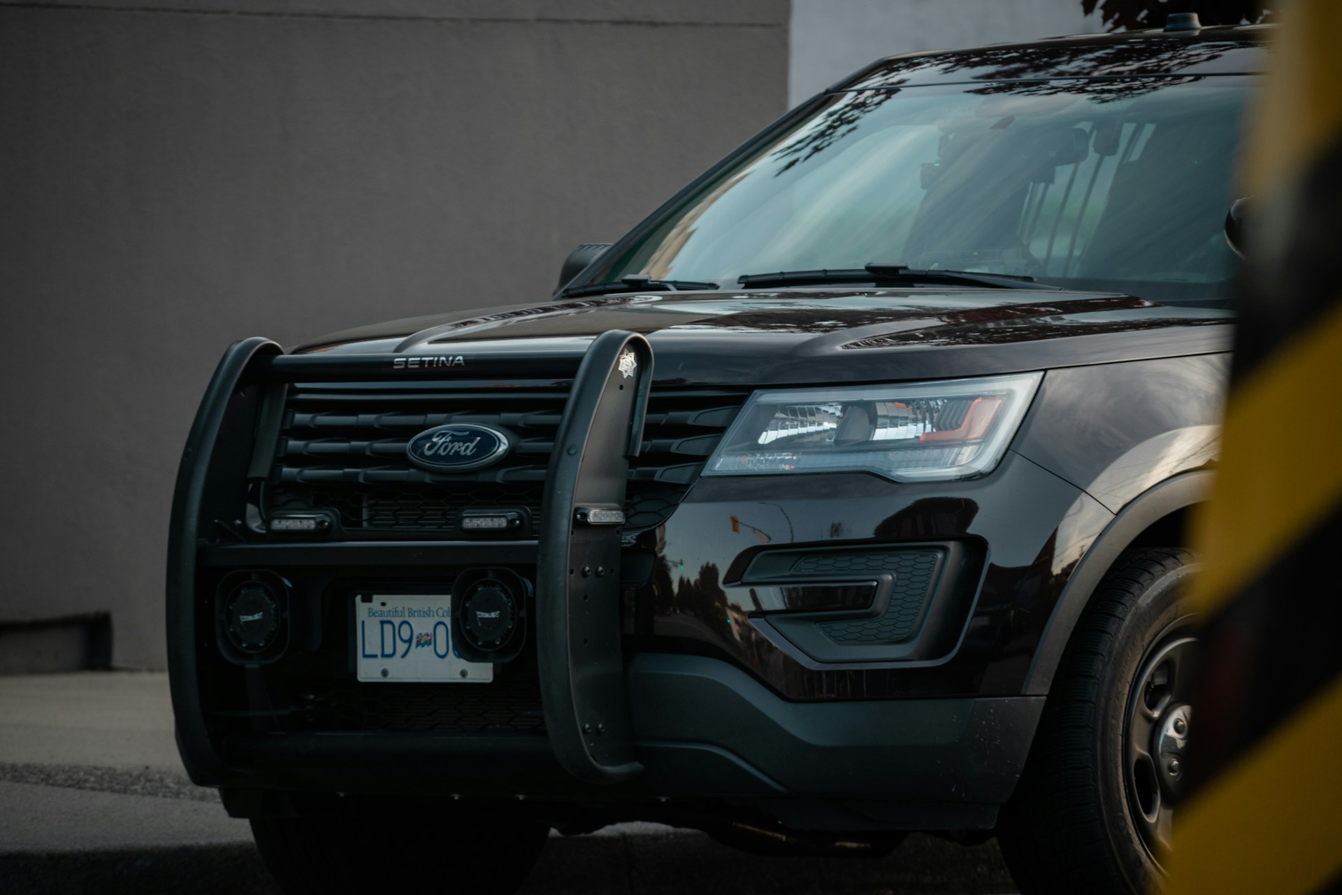 a police car parked on the side of the road