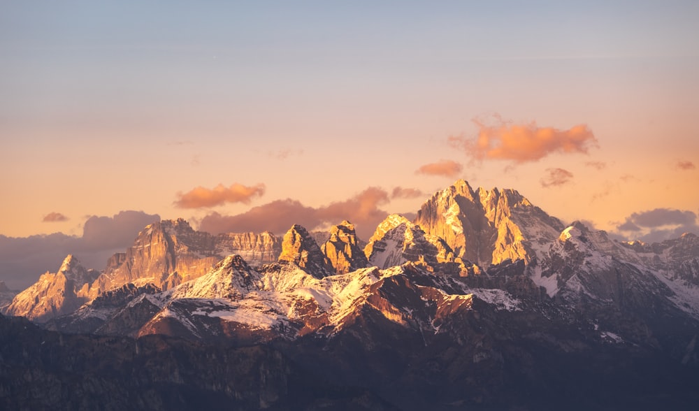 a view of a mountain range at sunset