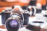 A cinematic close-up of a vintage camera with soft focus background.