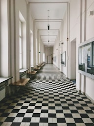 a black and white checkered floor in a building