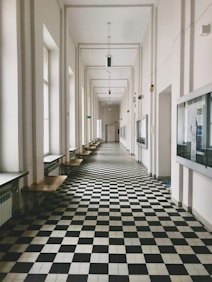 a black and white checkered floor in a building