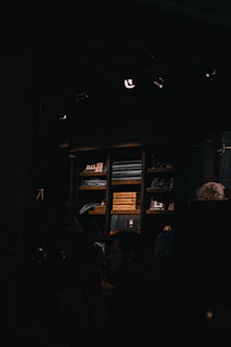 Wide shot of the organized storage area with neatly arranged furniture under soft lighting