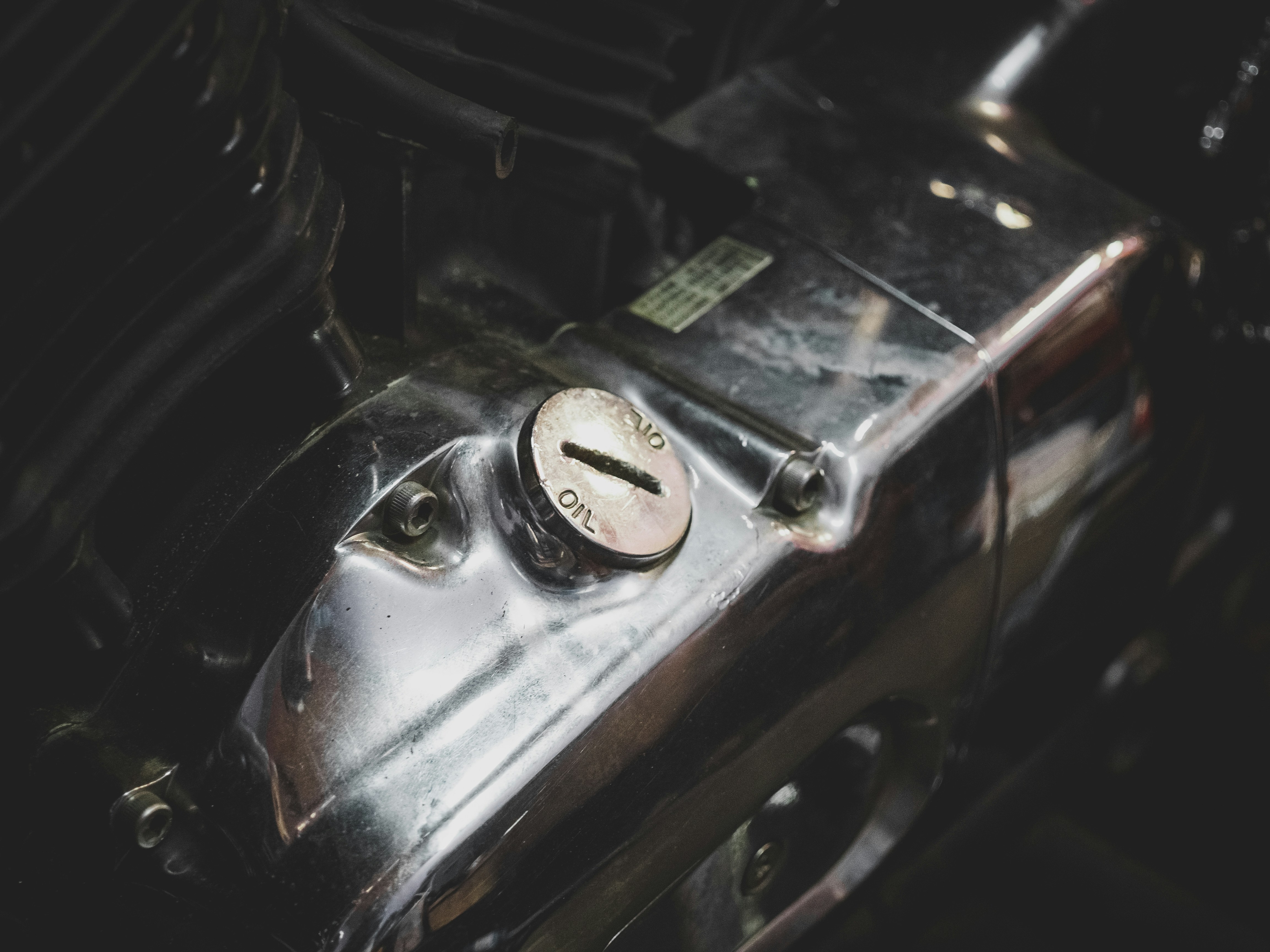 a close up of a metal object with a clock on it
