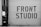 A large garage door features bold, industrial-style lettering spelling 'FRONT STUDIO'. To the left, a wall includes a box labeled 'WORKS OF FICTION'. The color scheme is monochromatic, with a focus on contrasting black and white.