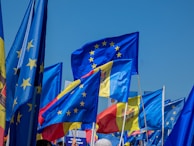 Flags of Spain and the European Union waving together.