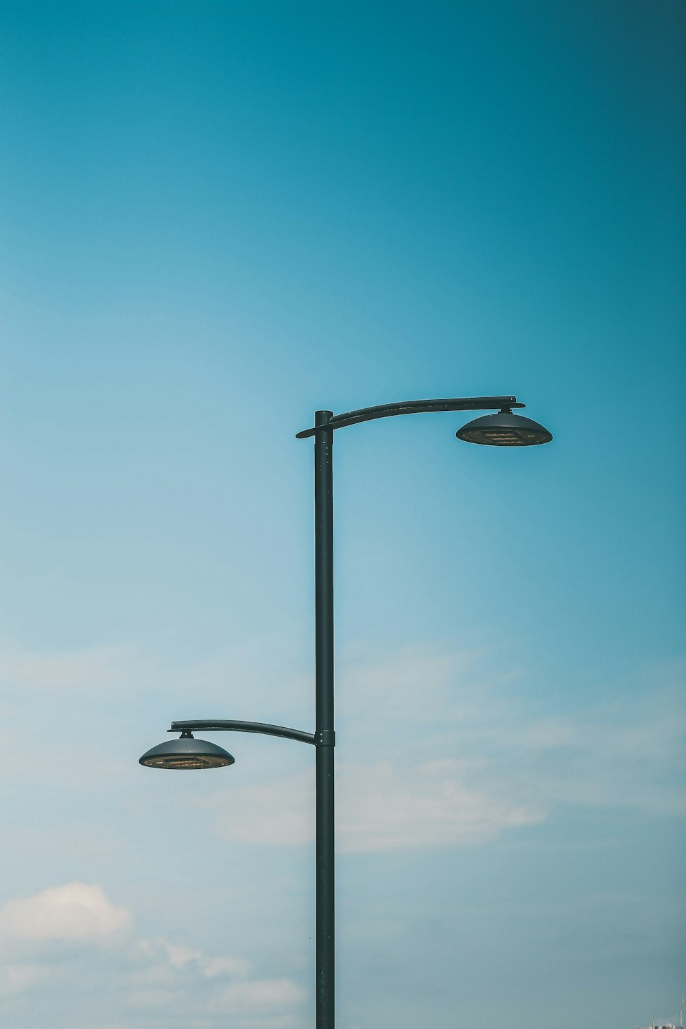 a couple of street lights sitting next to each other