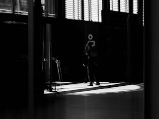 A dramatic film scene with intense lighting and actors.