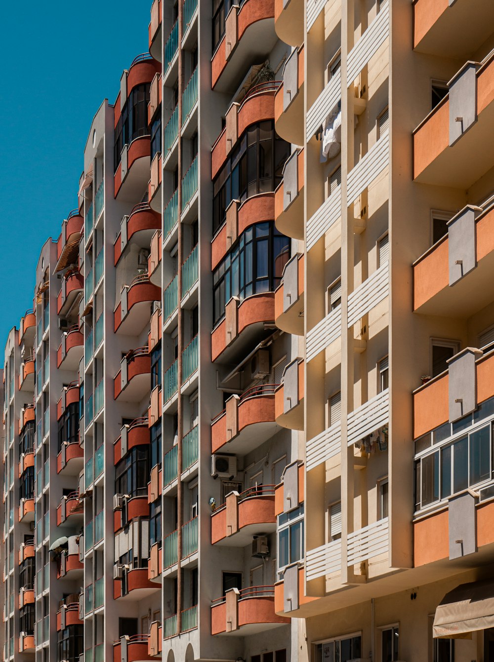 a very tall building with balconies and balconies on it