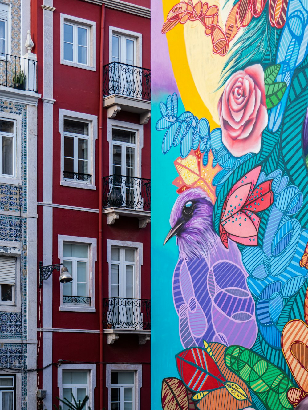 a colorful mural on the side of a building