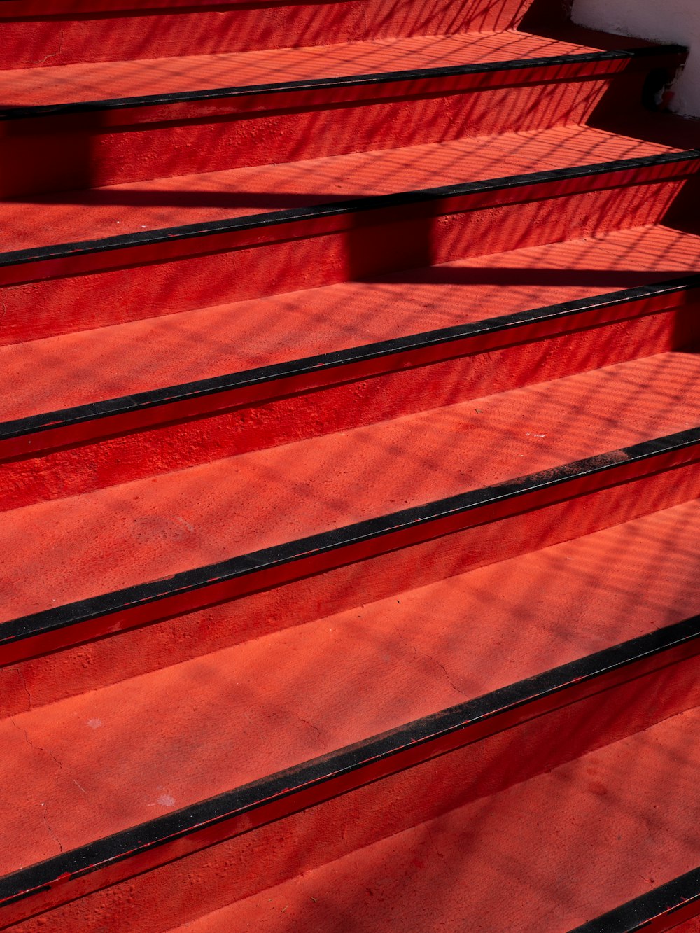 a bunch of red steps that are next to each other