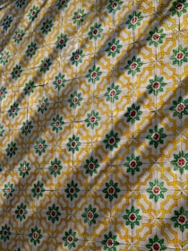 a close up of a wall with a pattern on it
