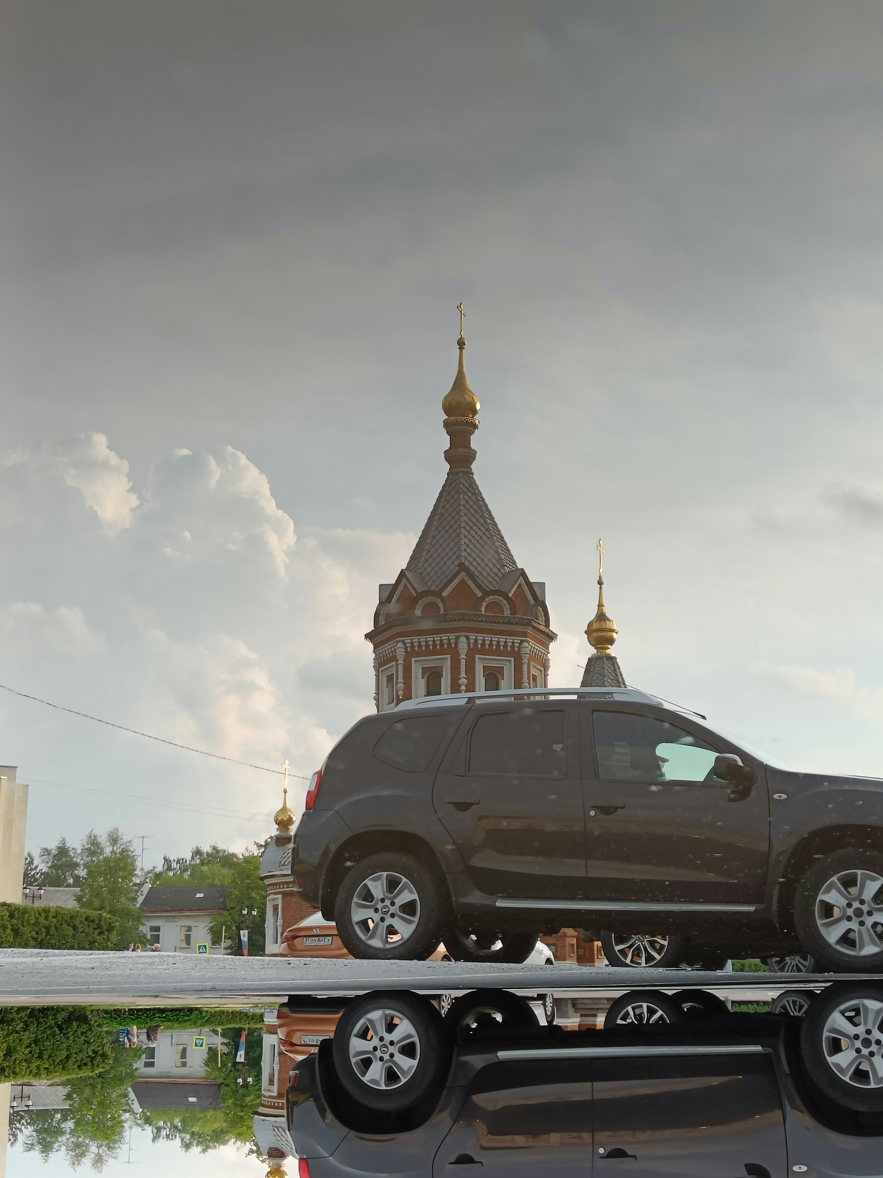 a truck with a car on the back of it