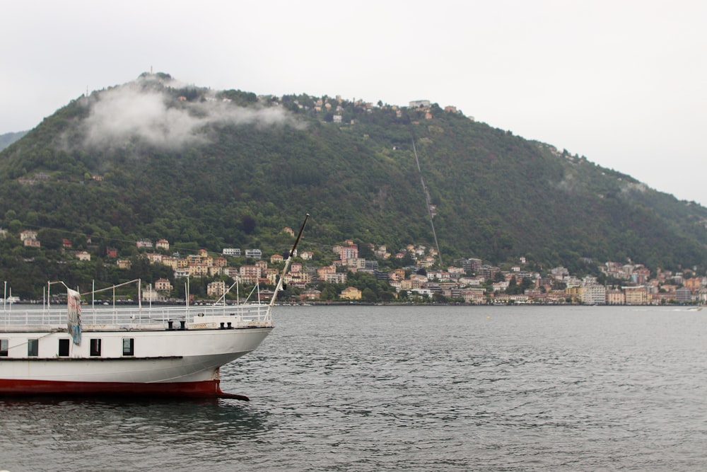 a large boat floating on top of a large body of water