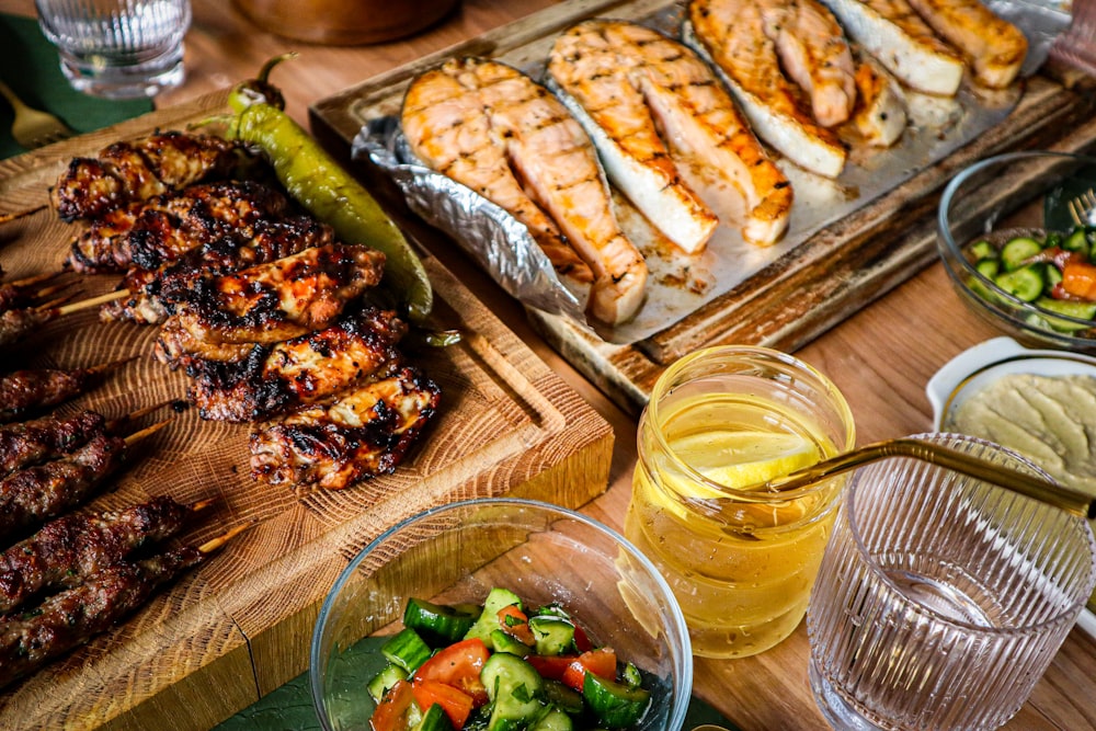 a wooden table topped with lots of food