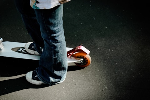 a person riding a skateboard on a street