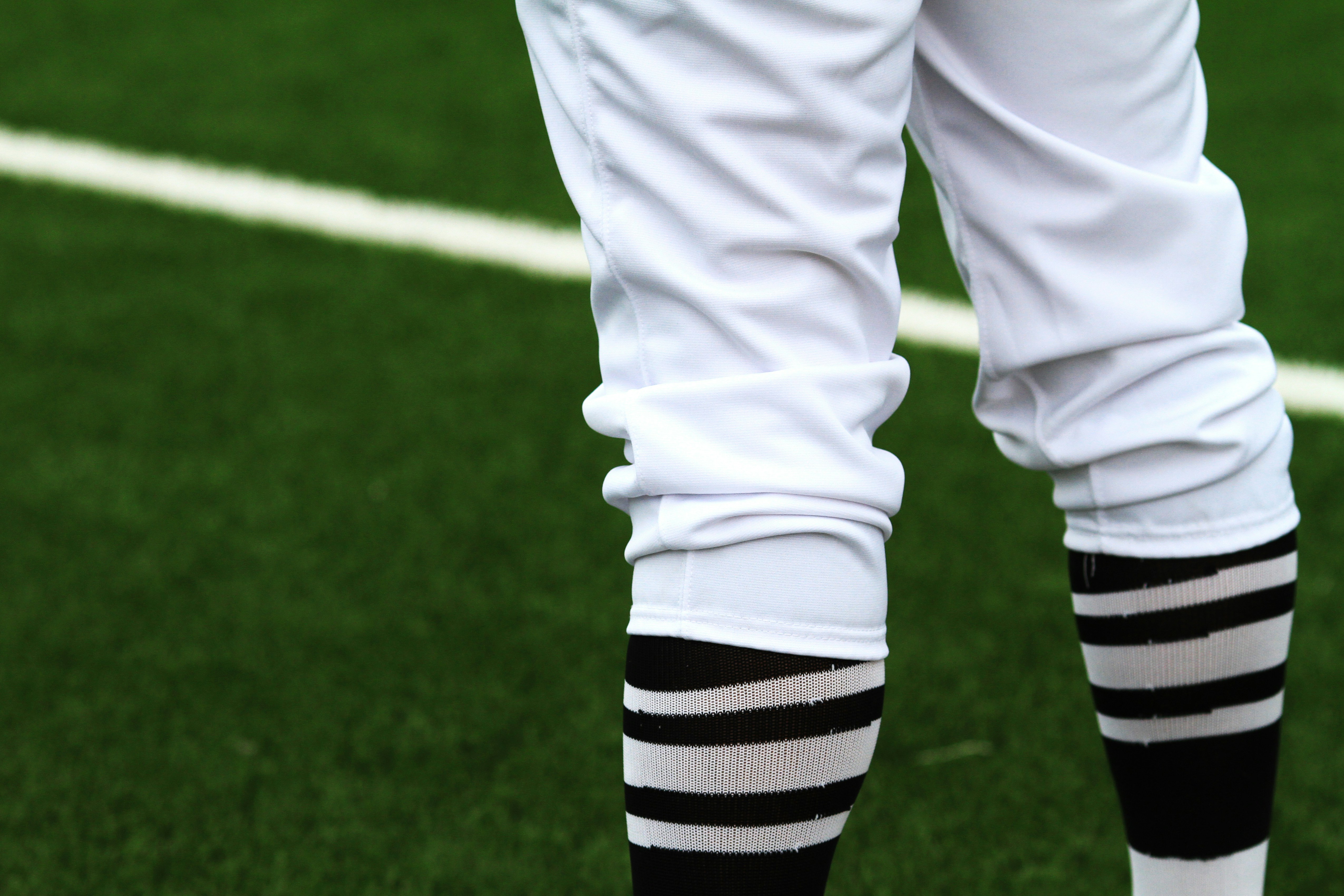 a baseball player standing on a baseball field