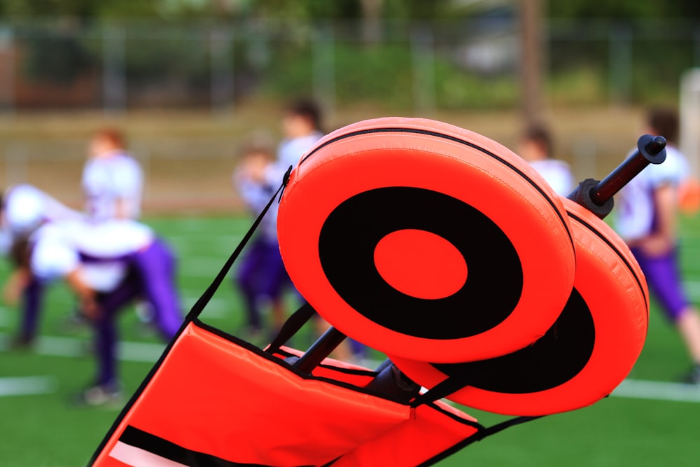 a group of people playing a game of frisbee