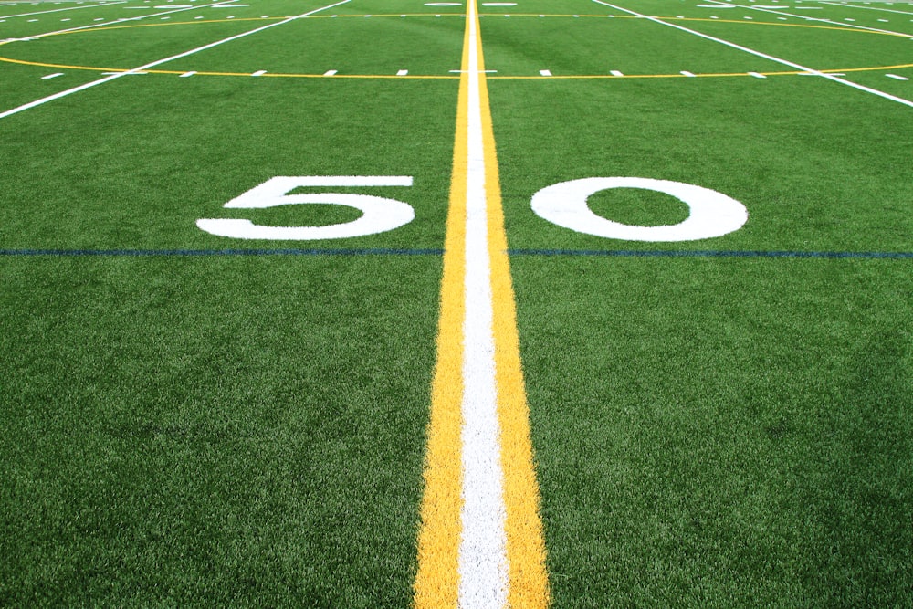 a football field with the number sixty on it