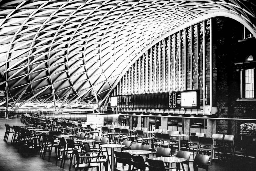 a black and white photo of a train station