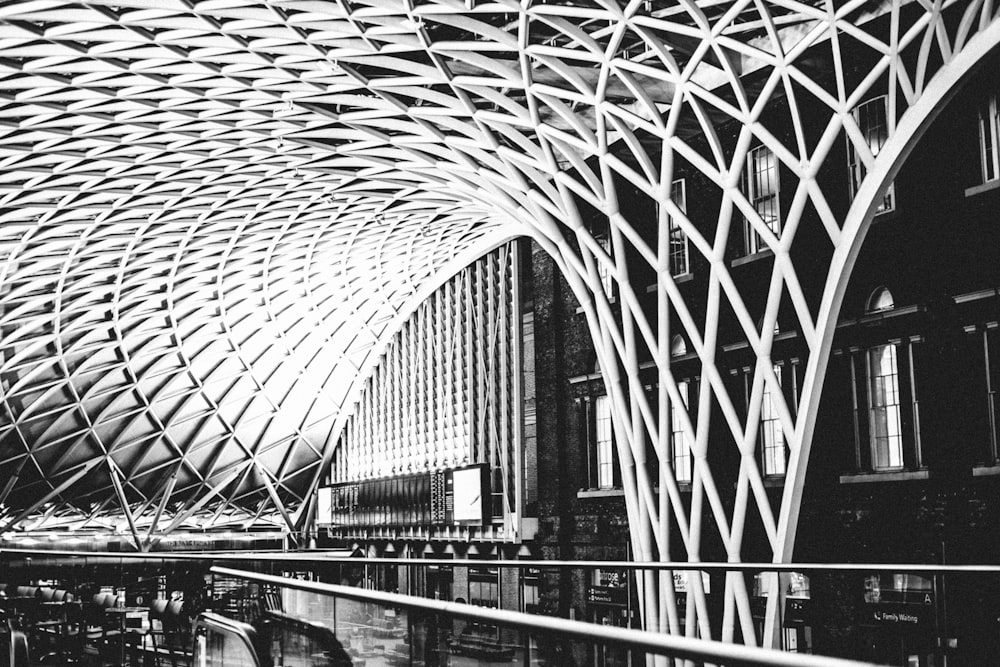 a black and white photo of a train station