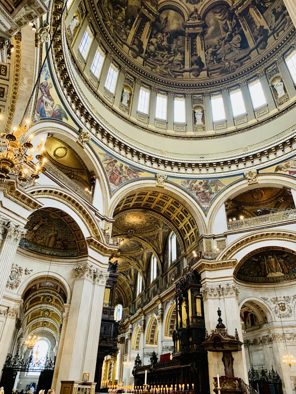 a church with a domed ceiling and chandelier