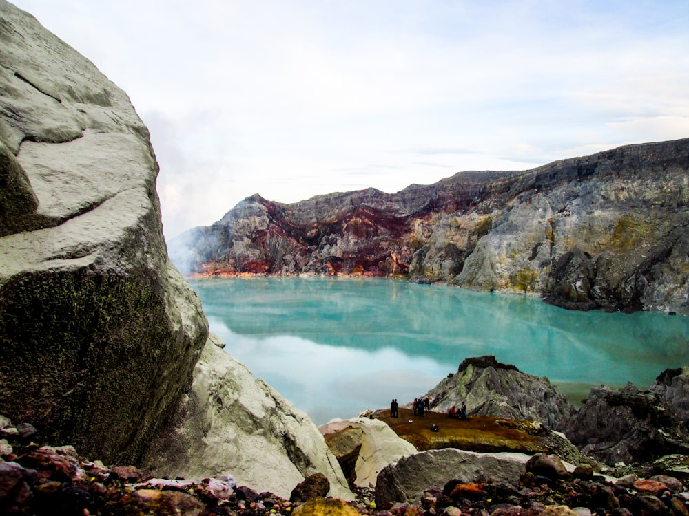 a large body of water surrounded by rocks