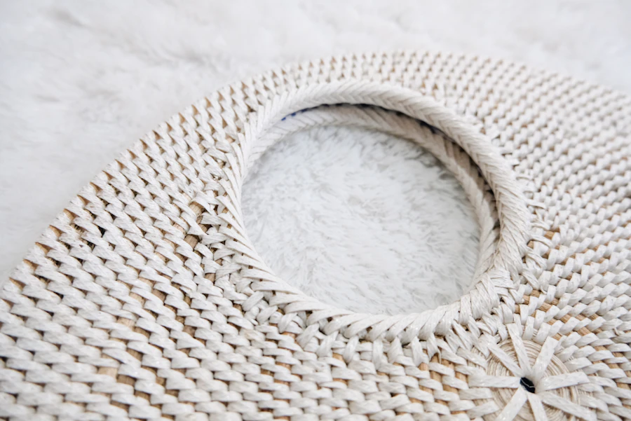 White woven handbag with a knotted handle