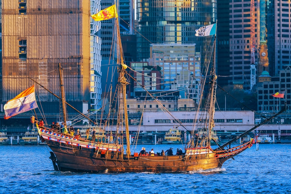 a large boat with lots of people on it in the water