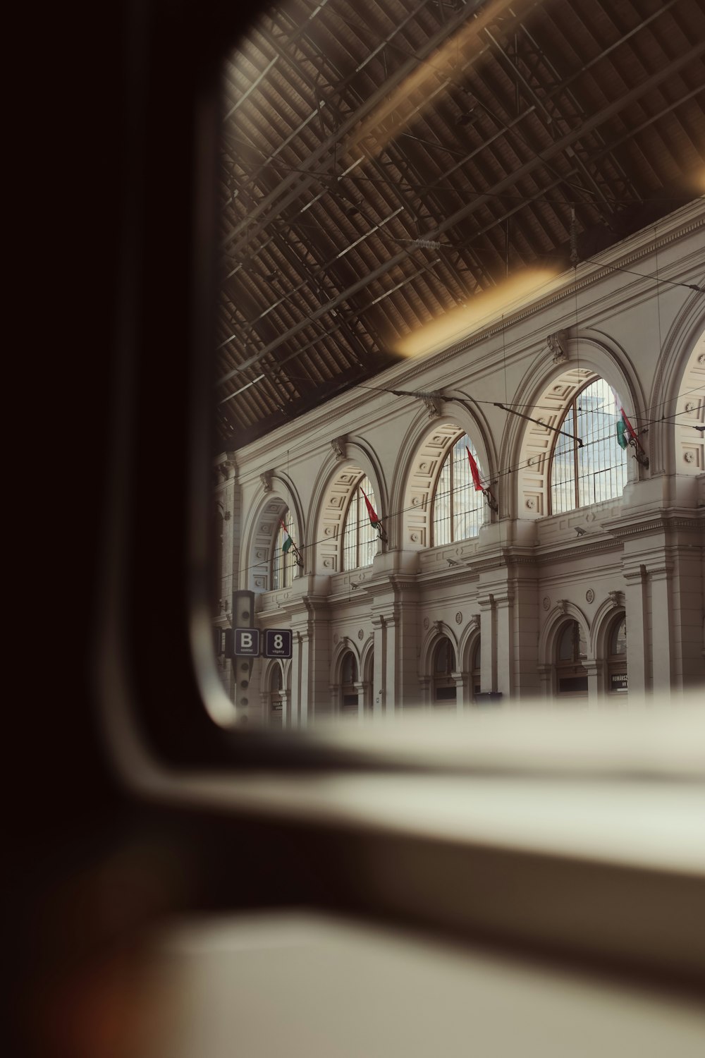 a view of a train station through a window