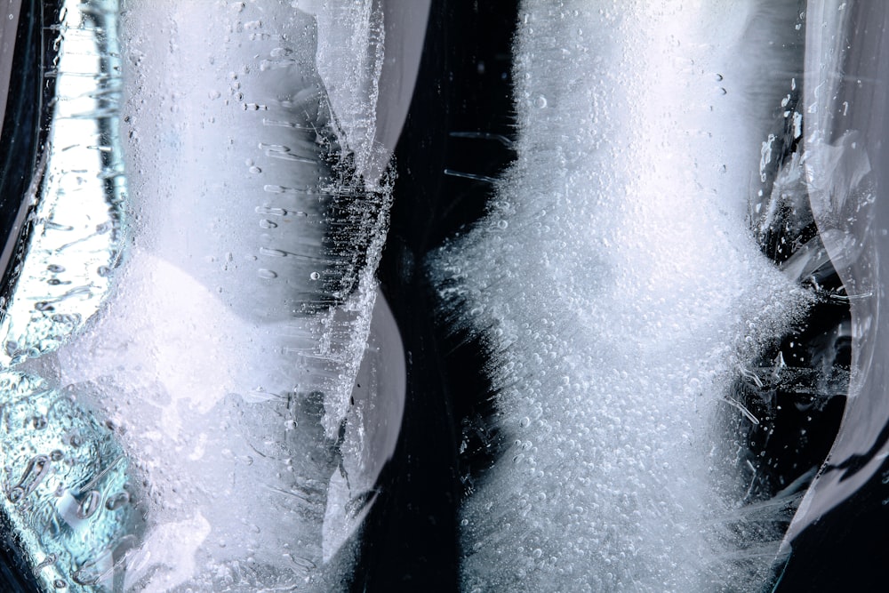 a close up of a pair of shoes covered in ice