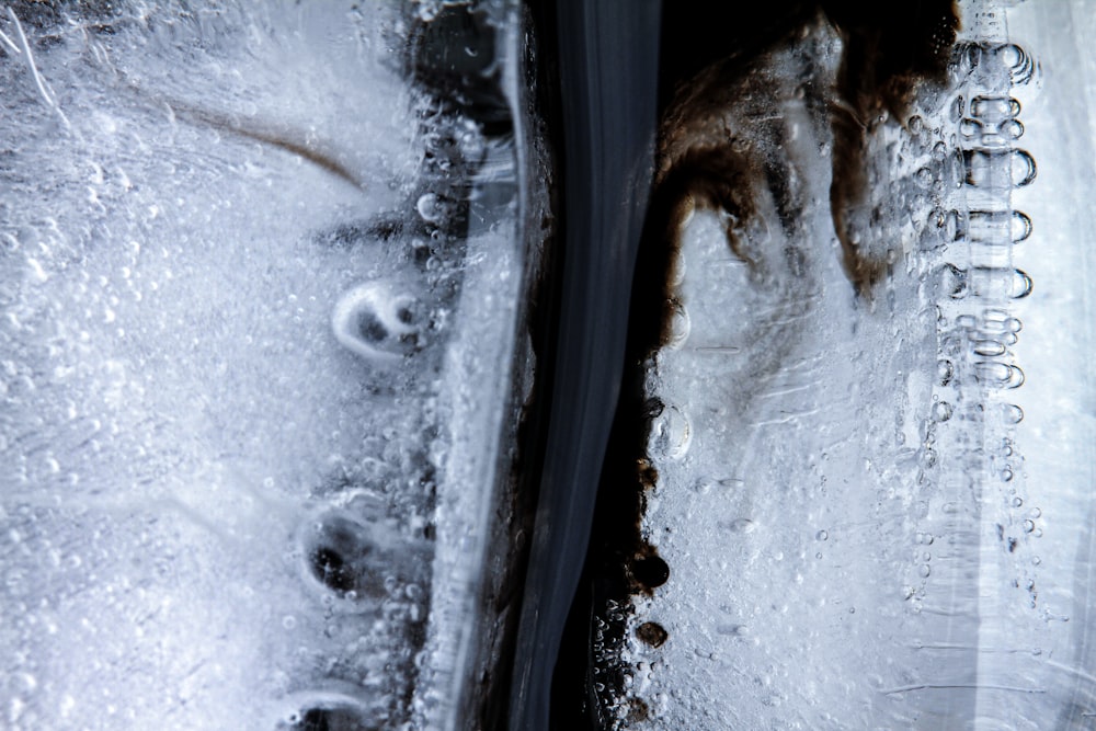 a close up of a pair of shoes covered in ice