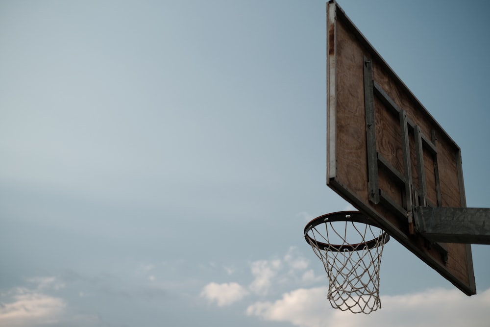 a basketball hoop with a basketball going through it
