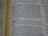 The image captures a page from an open book, likely a Bible, featuring prominently highlighted text in bold and large font, indicating chapter 13, titled 'A linen belt'. The surrounding text includes paragraphs of scripture in smaller font with several verses.