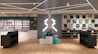 A modern retail store interior featuring shelves stocked with various merchandise including toys, figurines, and colorful boxes. The design includes sleek black counters with a gaming-themed logo, illuminated geometric light fixtures on the ceiling, and wooden flooring. Artwork and apparel are displayed on the walls, providing a vibrant and organized shopping environment.