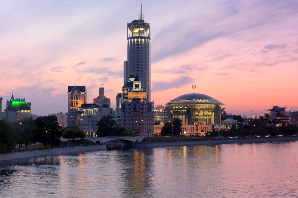 a view of a city skyline at dusk