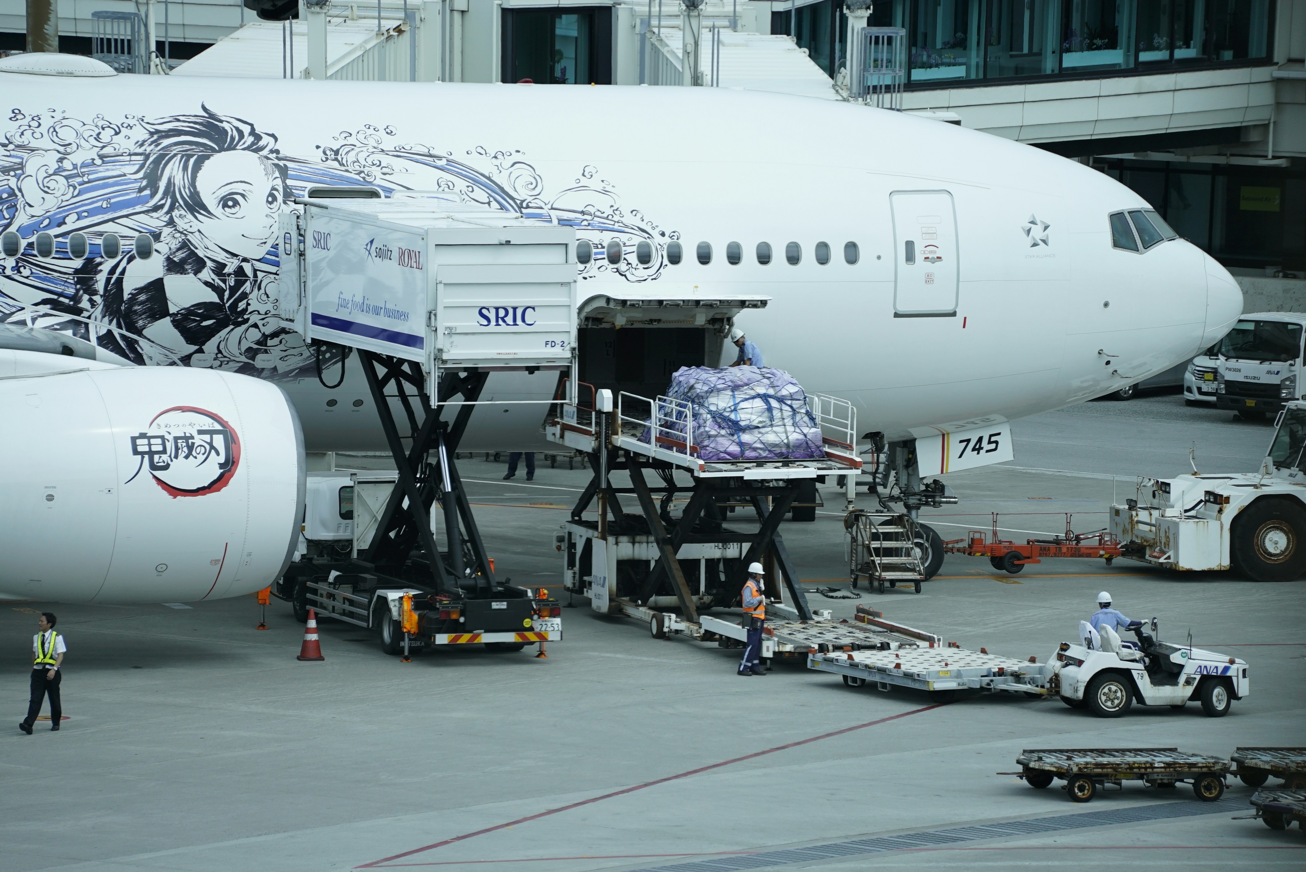 Something was being unloaded from the aircraft.