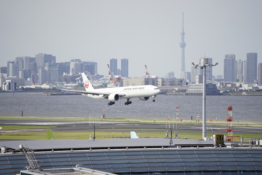an airplane taking off from an airport runway, Welcome back.