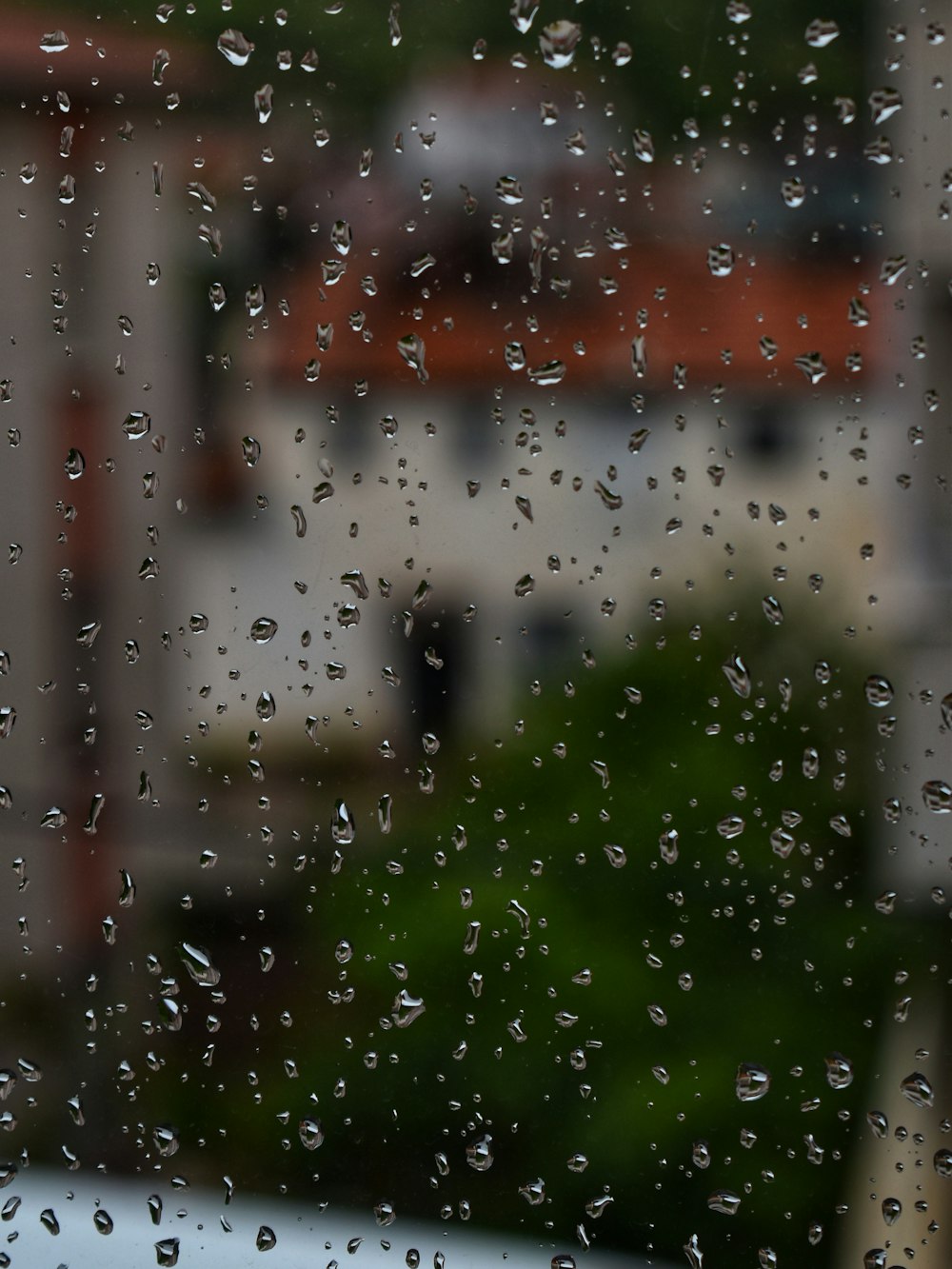 a window with rain drops on it