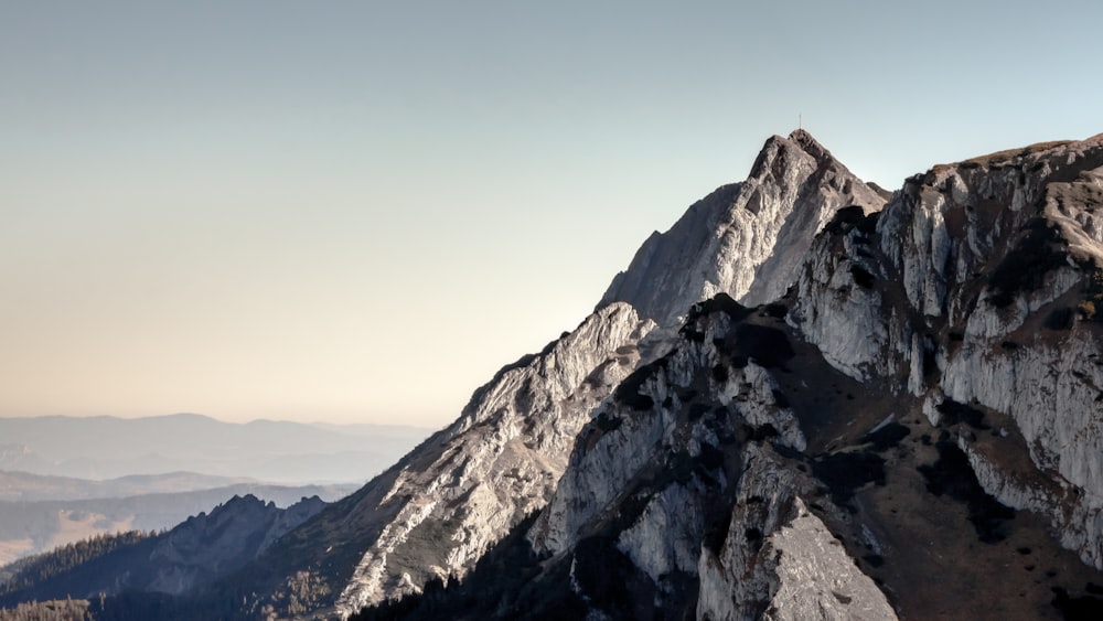 a view of a mountain from the top of a mountain