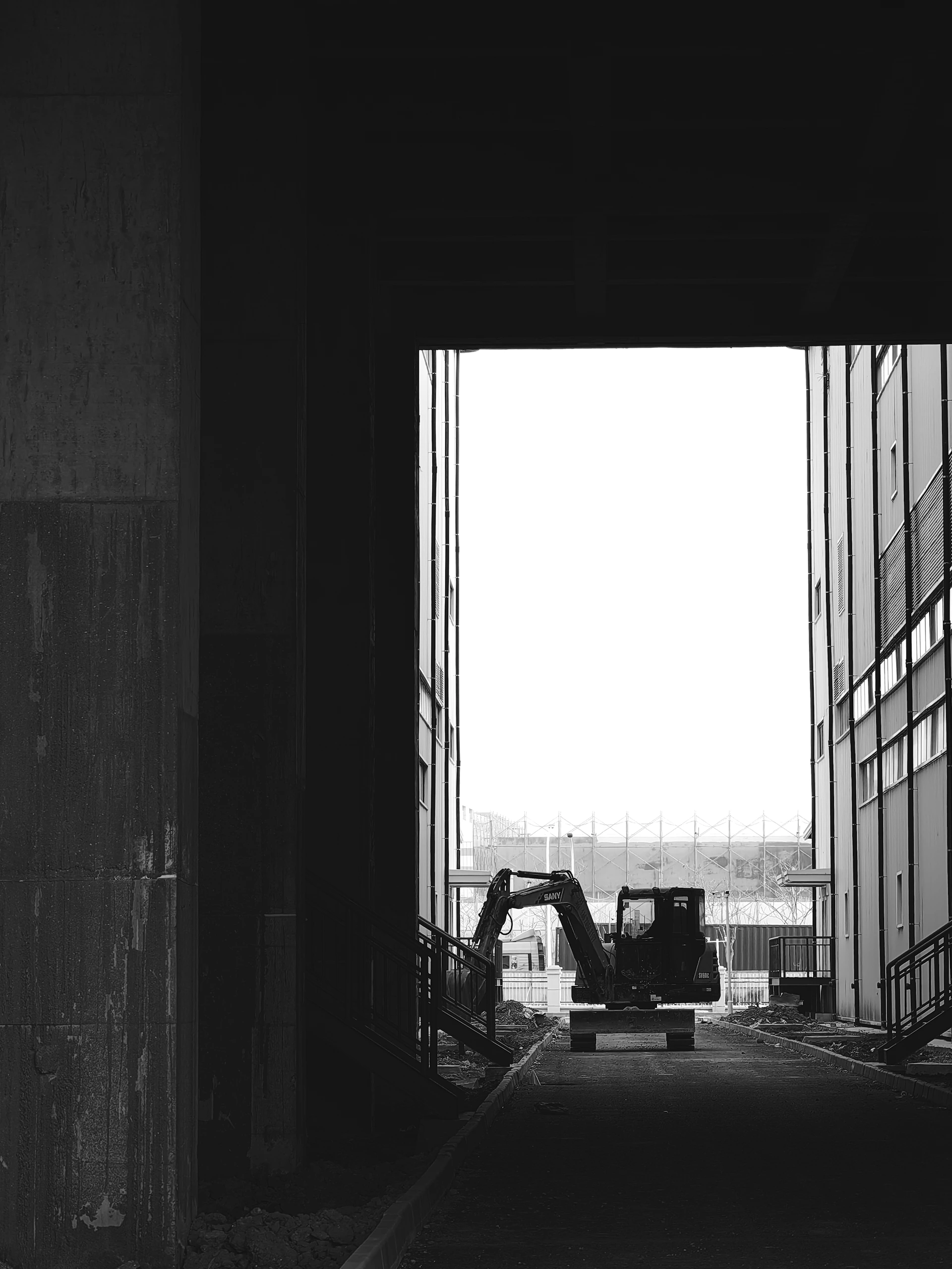 a black and white photo of a construction site
