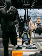 Stylish athletic apparel displayed on mannequins.