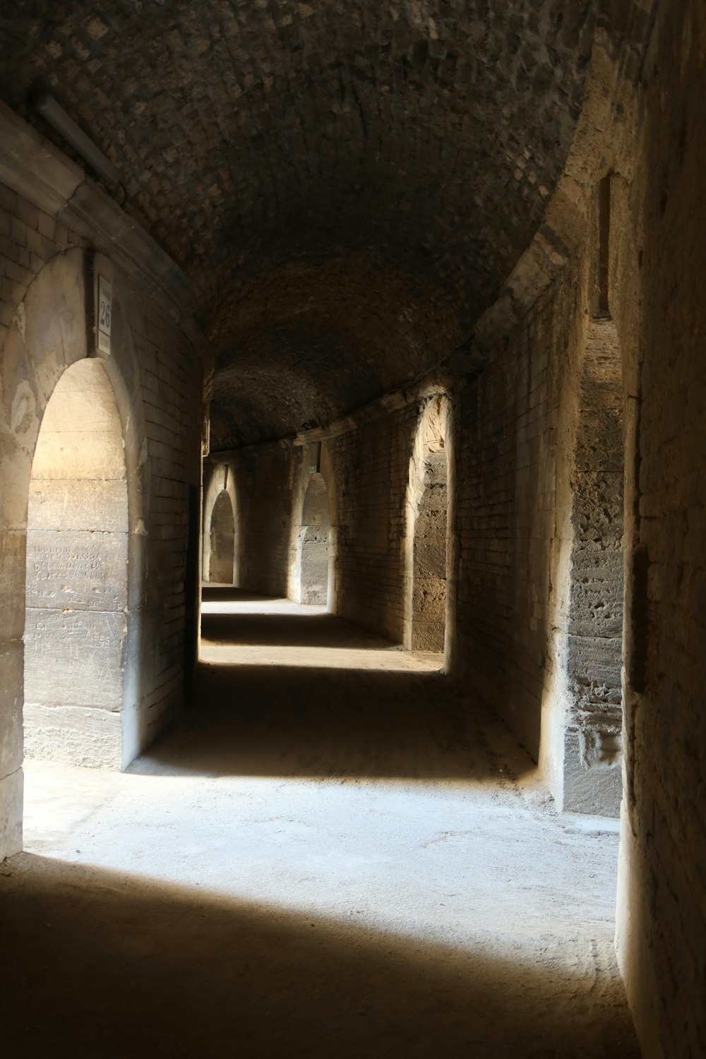 a long tunnel with a light at the end of it