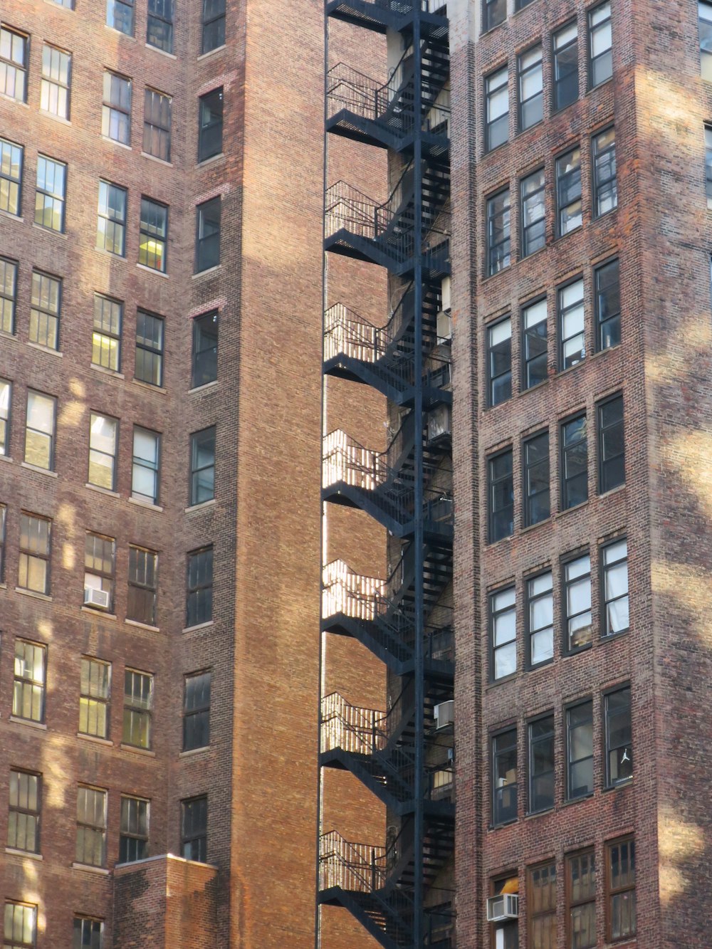 a fire escape on the side of a tall building
